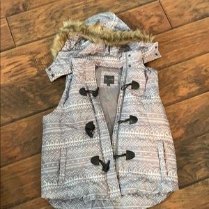 Limited puffer vest with fake fur trimmed hood